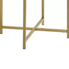 Dekorativer Beistelltisch mit einer Tischplatte aus Klarglas und goldener Oberfläche.